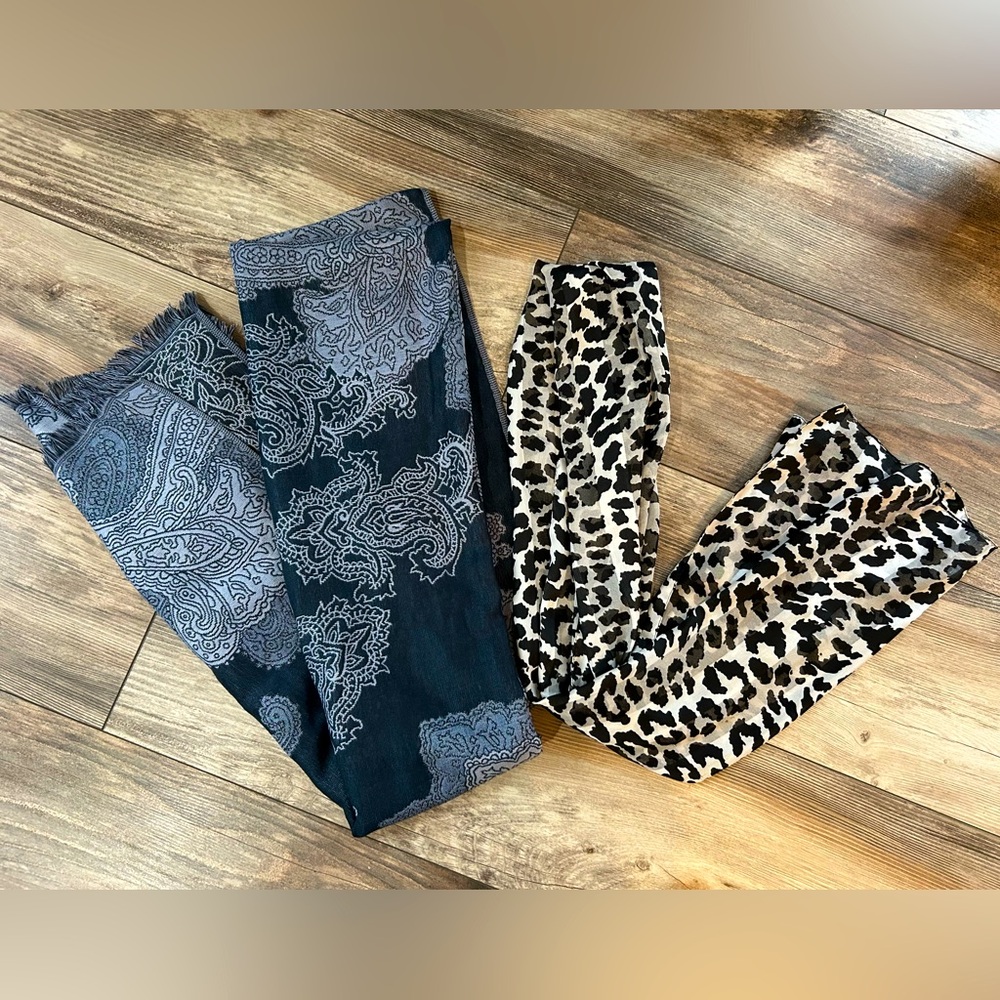 1 shawl and 1 silky scarf
(Shawl is new with tags)